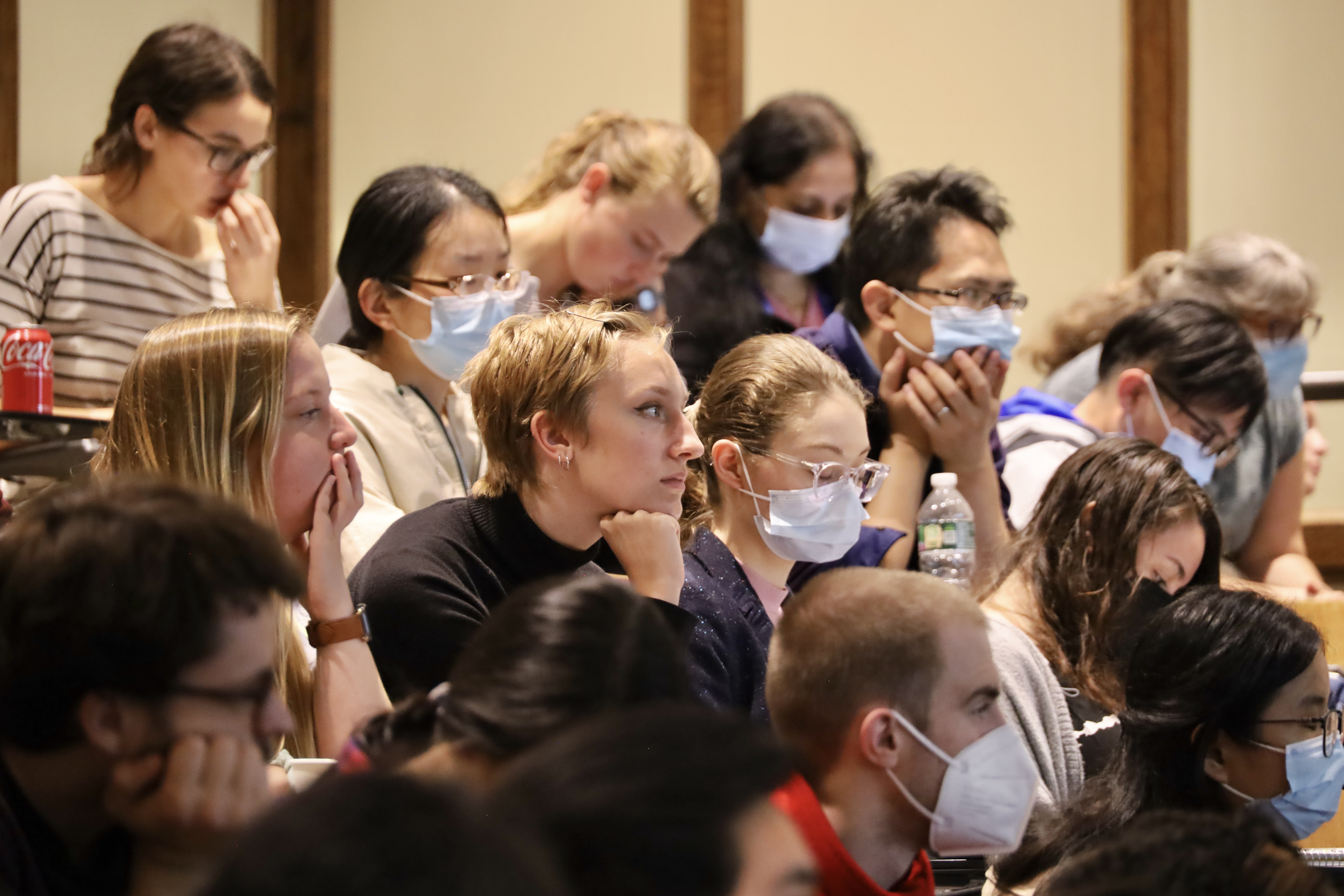 students sitting in classroom lecture hall