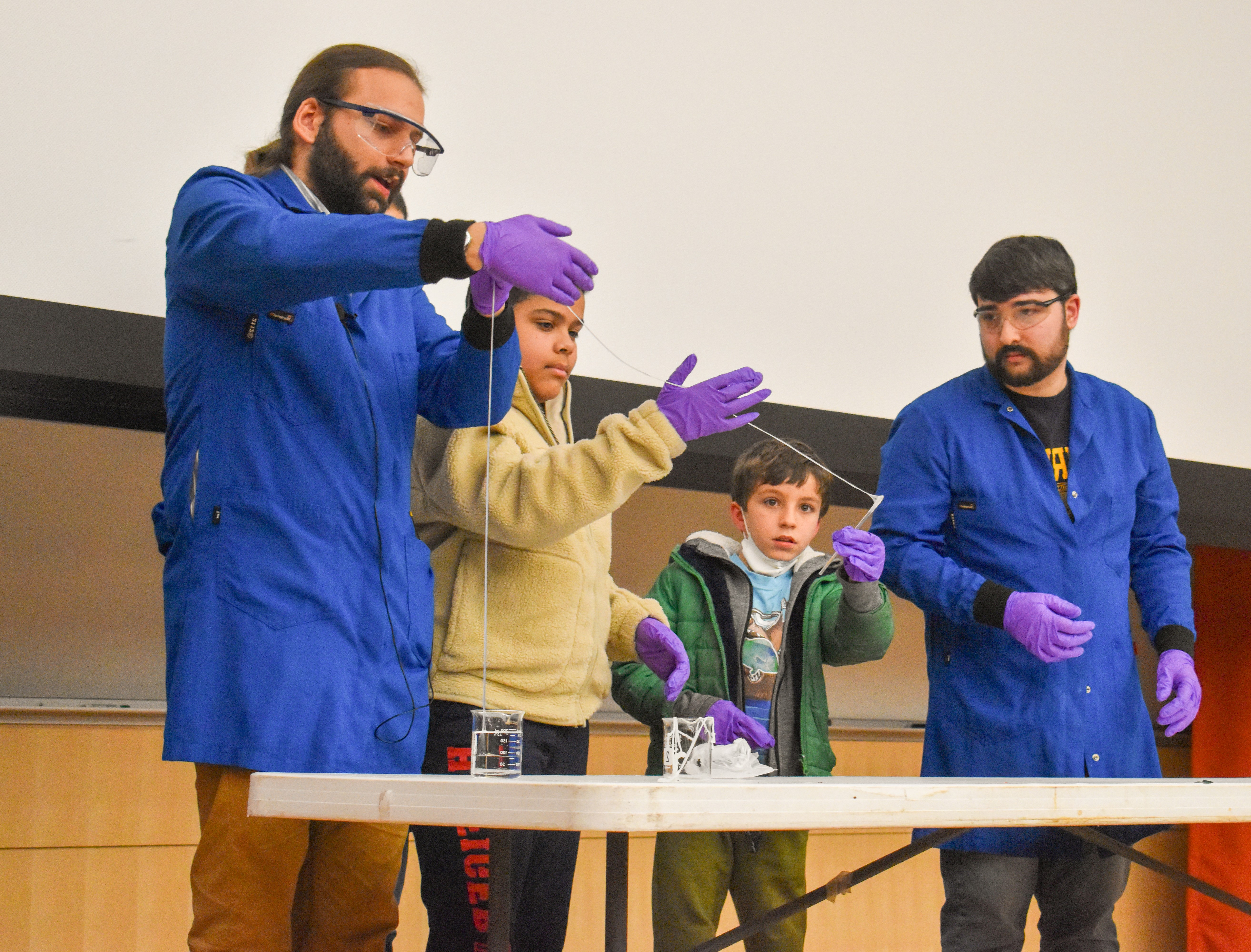 students and kids experimenting