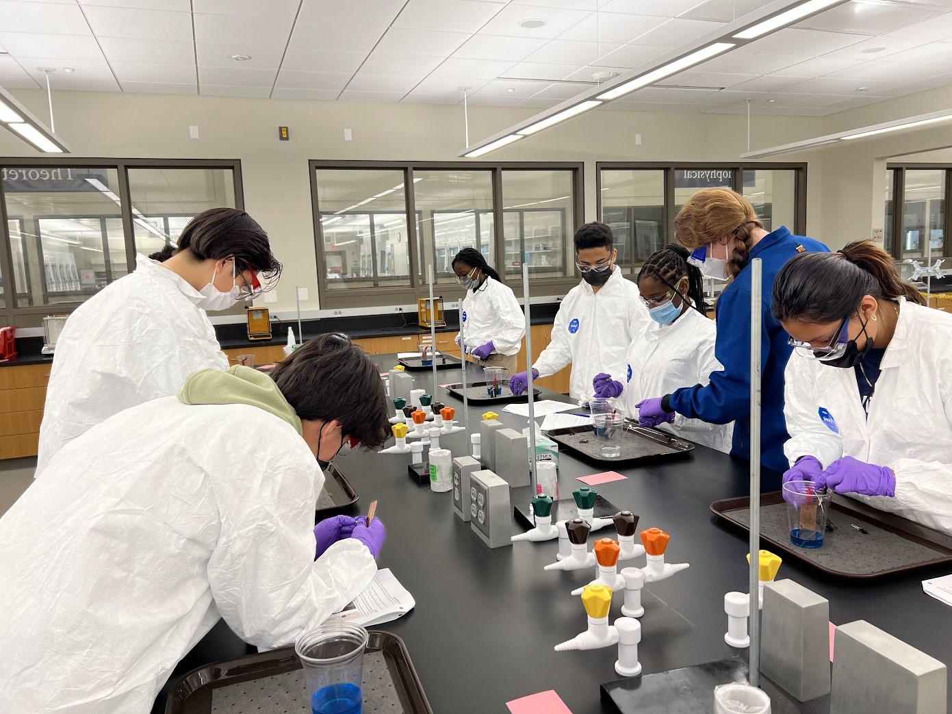 students experimenting on lab bench