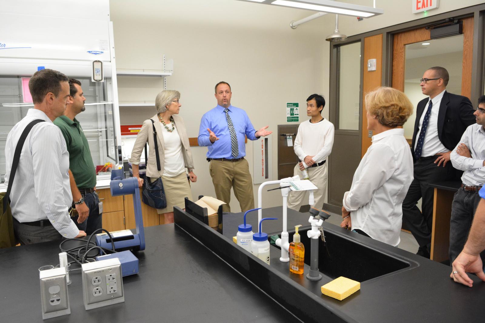 people talking in new lab space