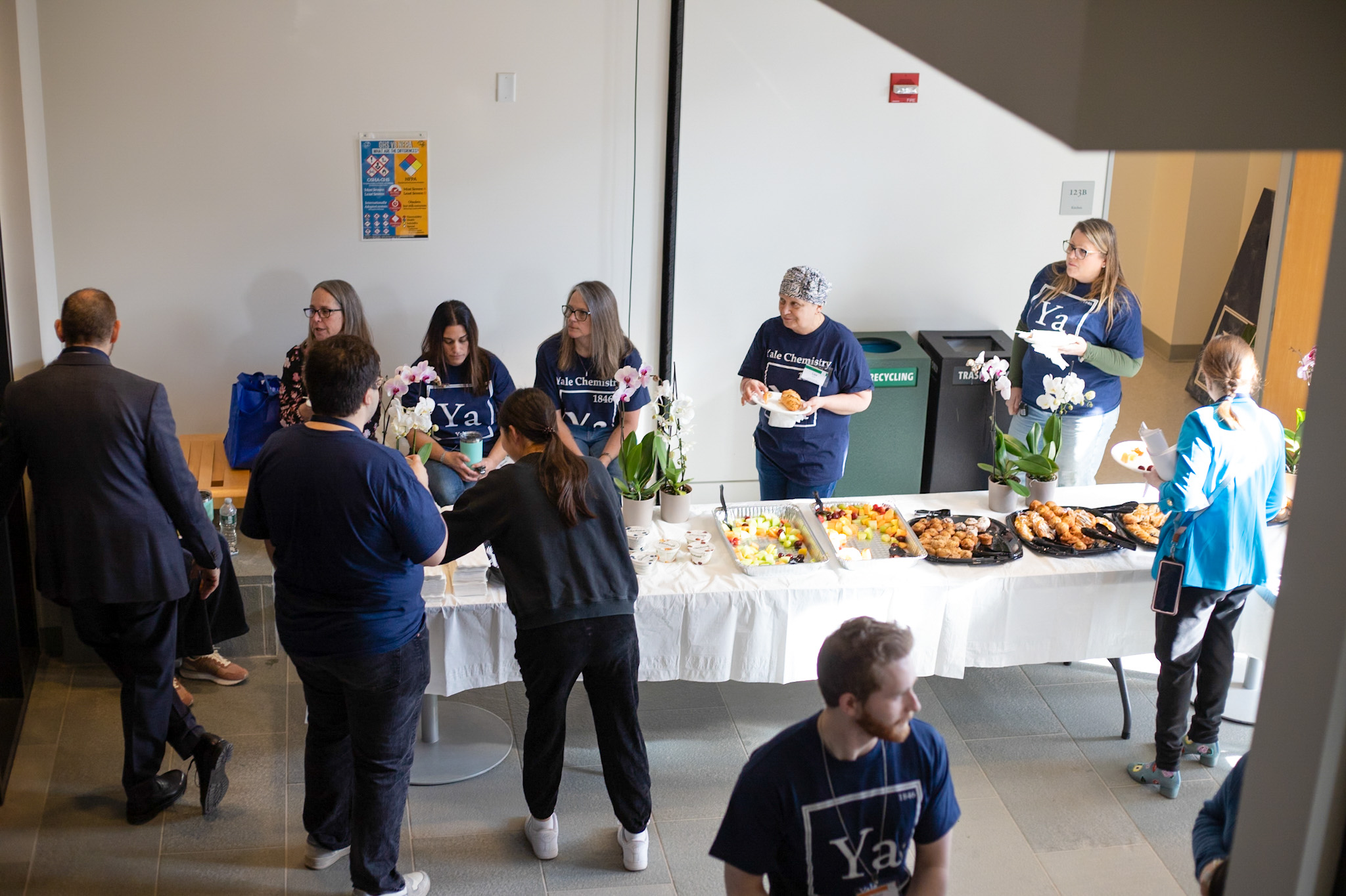 staff standing at breakfast buffet