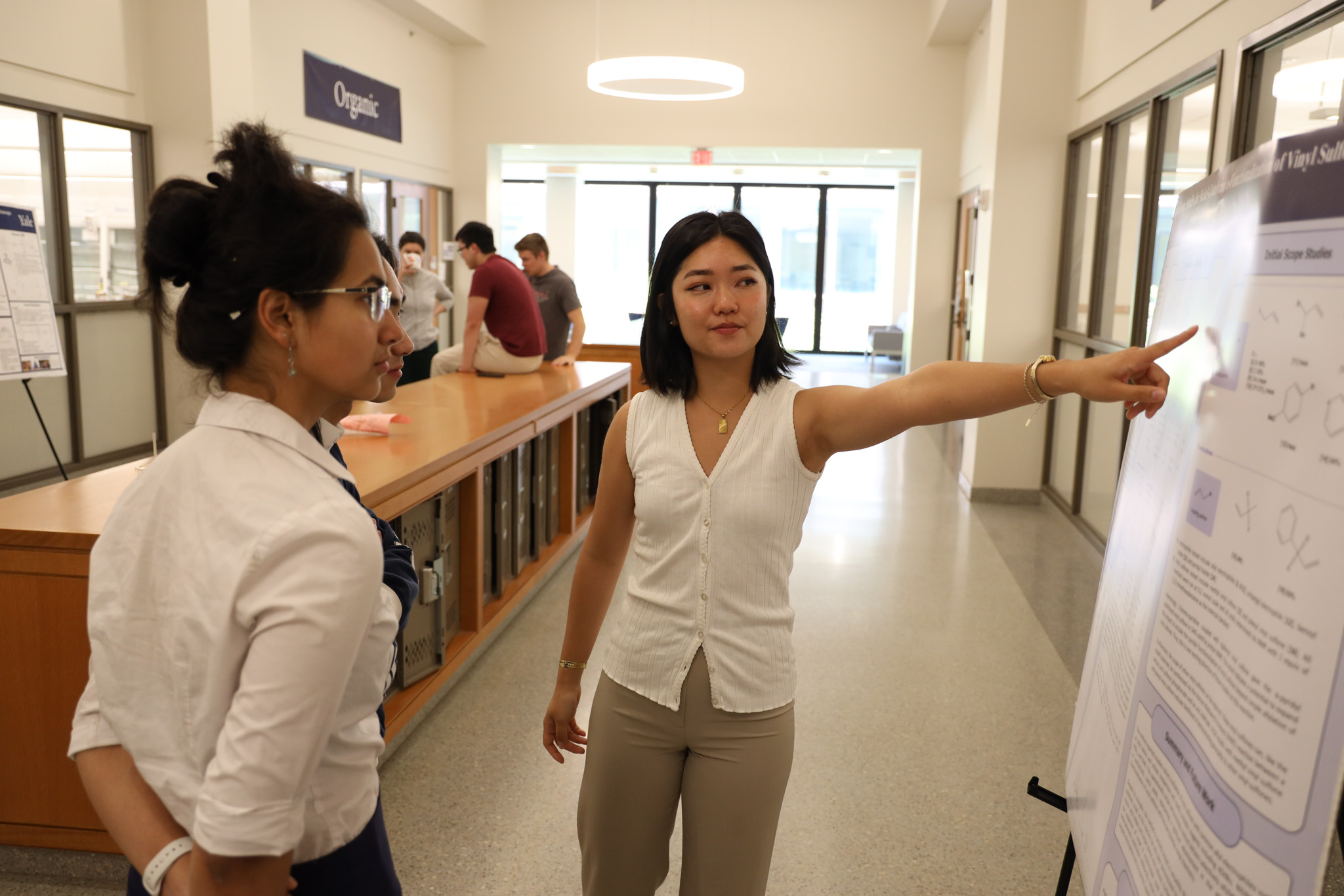 student presenting poster