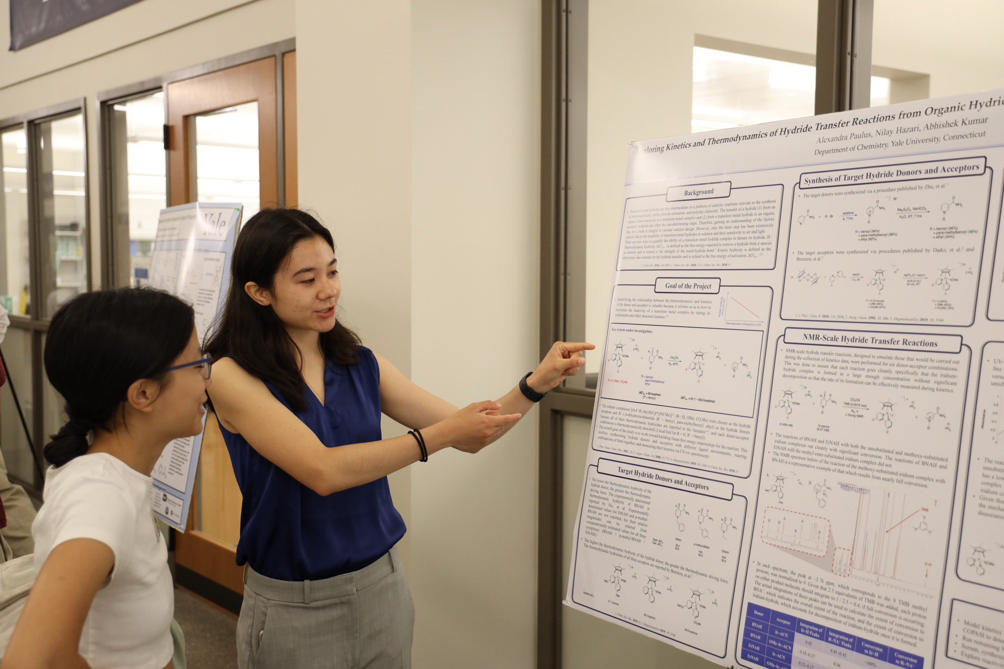 student presenting poster