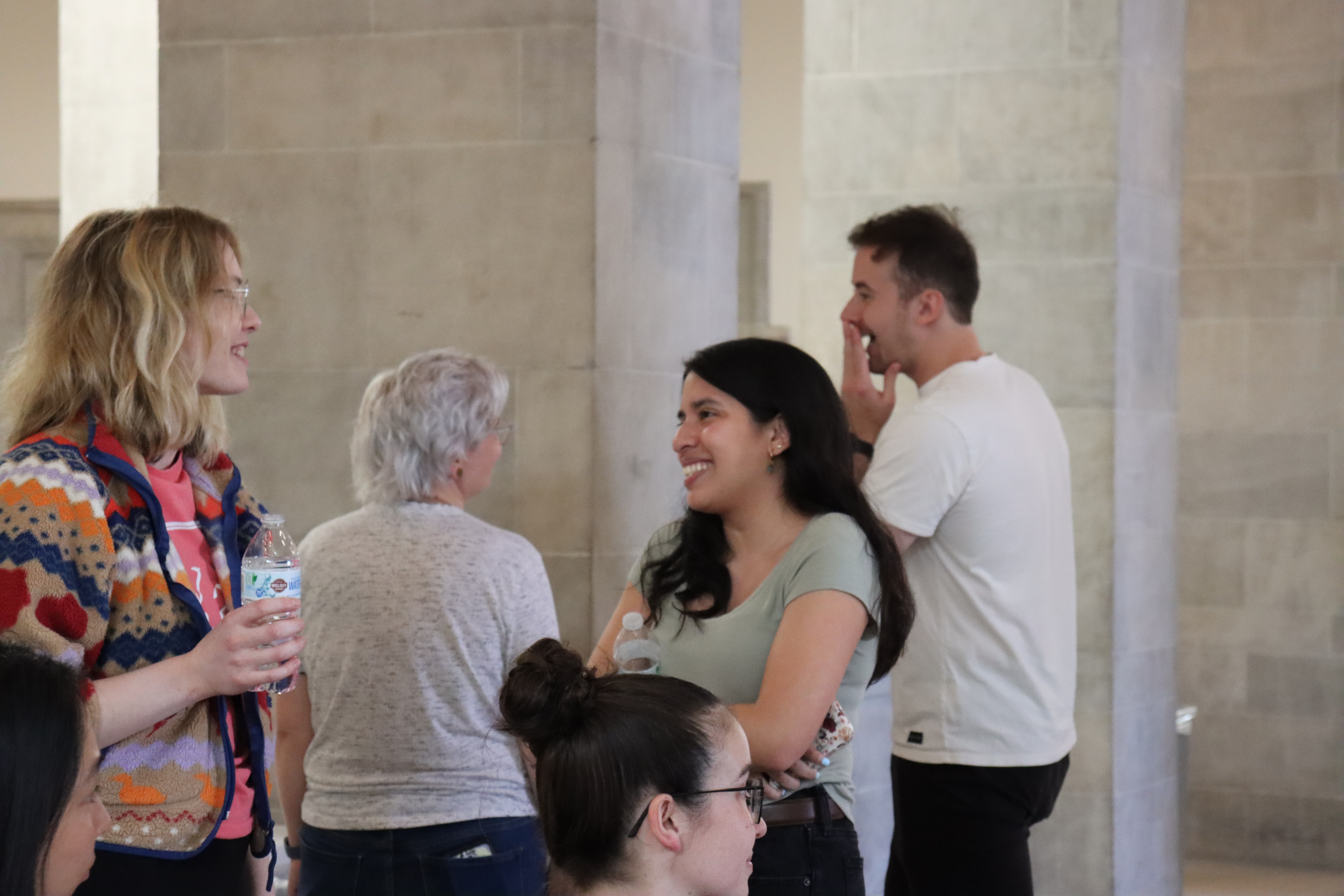 people laughing hallway