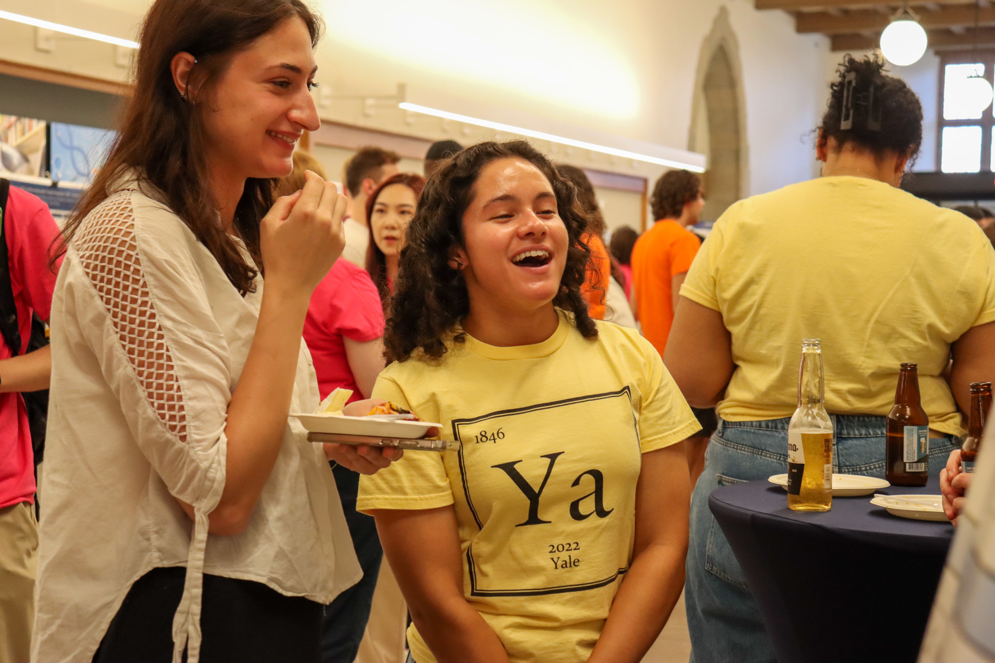 two people looking at poster