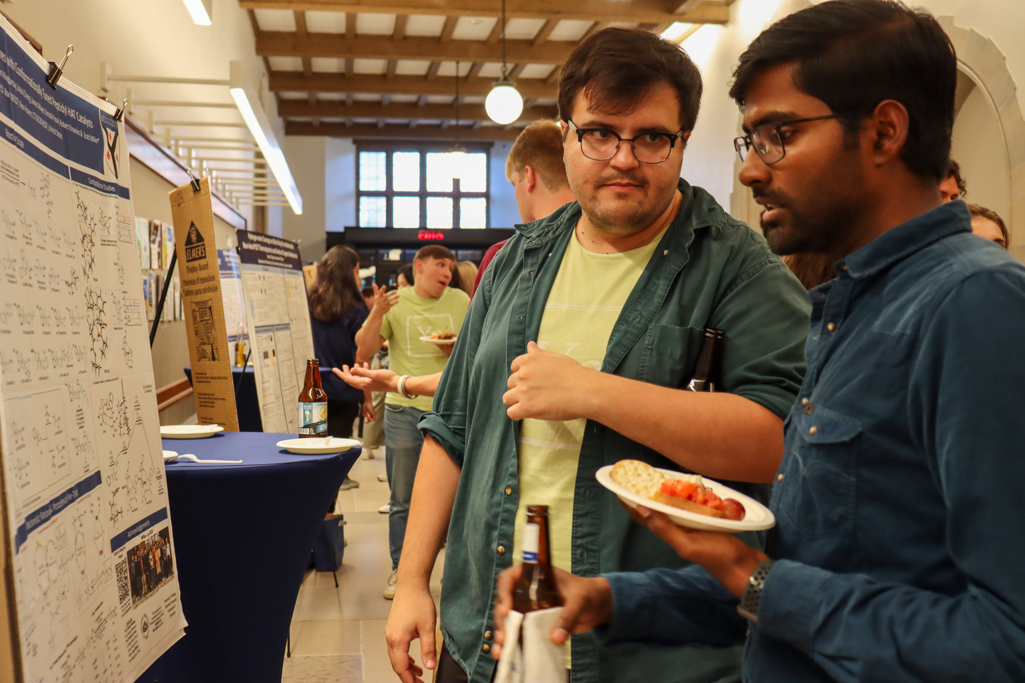 two people talking poster session