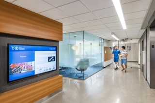 men walking in hallway