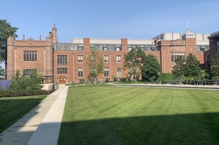 long brick building and grass