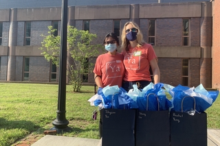 volunteers and gift bags