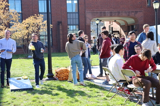 cornhole game and crowd