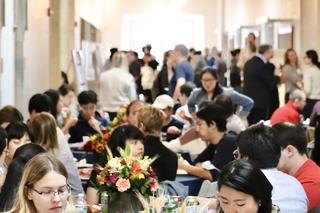 hallway scene of lunch eating and posters
