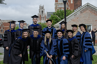 group of students in commencement gowns