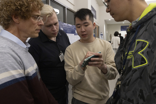 people looking at phone