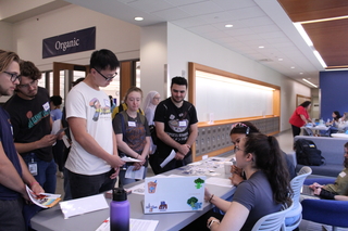 people at registration table
