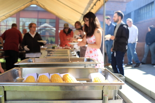 food buffet and people in line