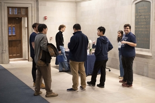 people standing in lobby