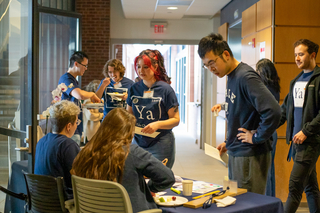 volunteers at table