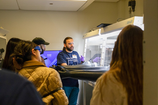 students at chemical glove box