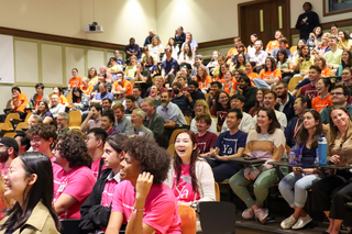 large audience laughing