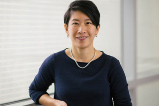 person wearing blue sweater