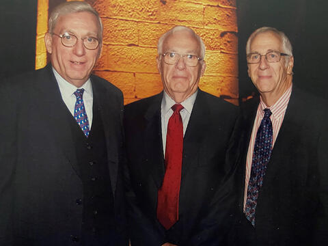 three men in suits