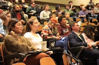 audience of people and chairs