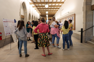 women standing in hallway