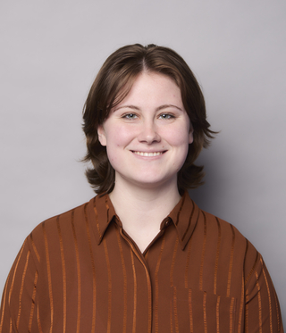 Person in brown shirt