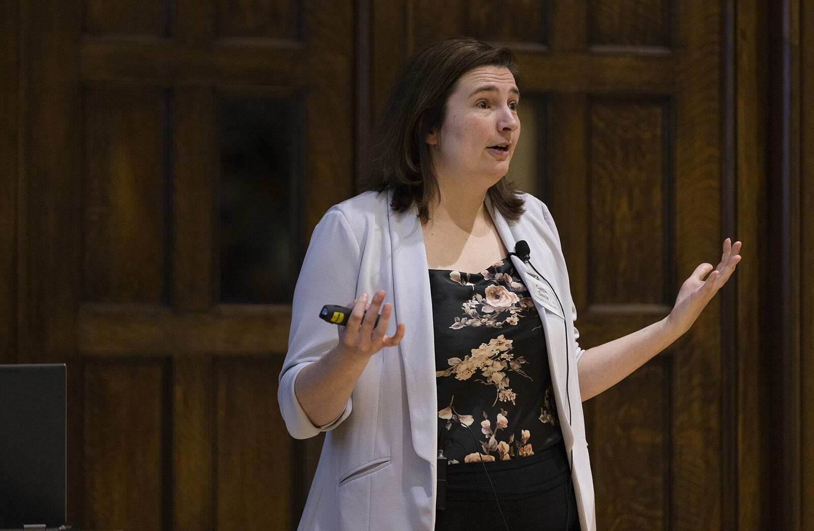 woman speaking and gesturing